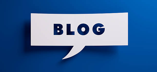 istock White speech bubble with the word blog in front of a blue colored wall - 3D illustration 2232019451