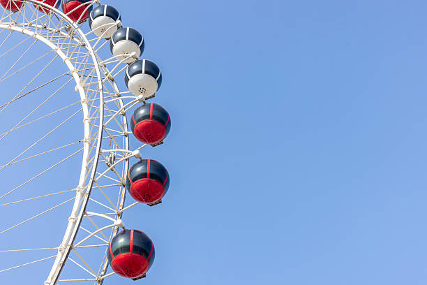 istock Colorful Ferris wheel against the blue sky 2232024360