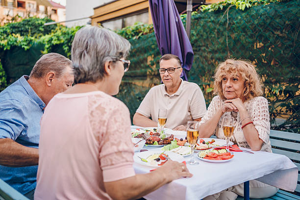 istock Senior friends enjoy in dinner 2232024824