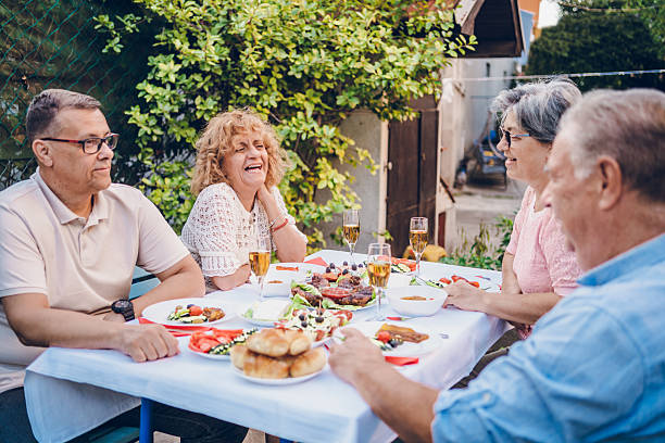 istock Senior friends enjoy in dinner 2232025235