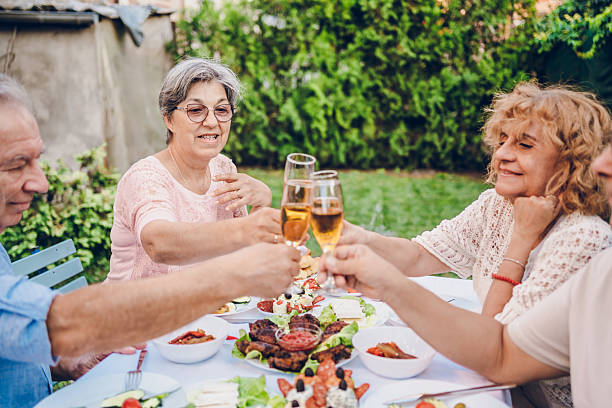 istock Senior friends enjoy in dinner 2232027833