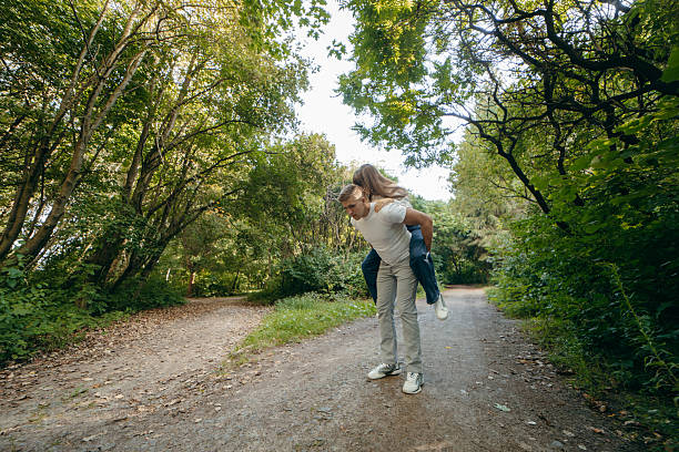 Young couple relax at nature at summer