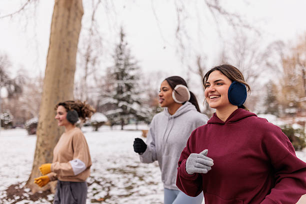 istock Women jogging outdoors on chilly winter morning 2232034061