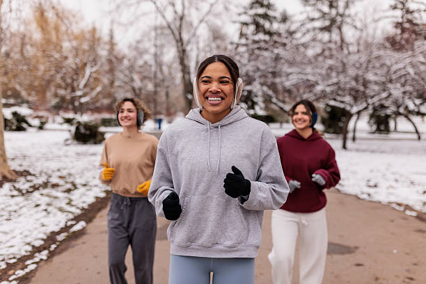 Women running outdoors on chilly winter morning