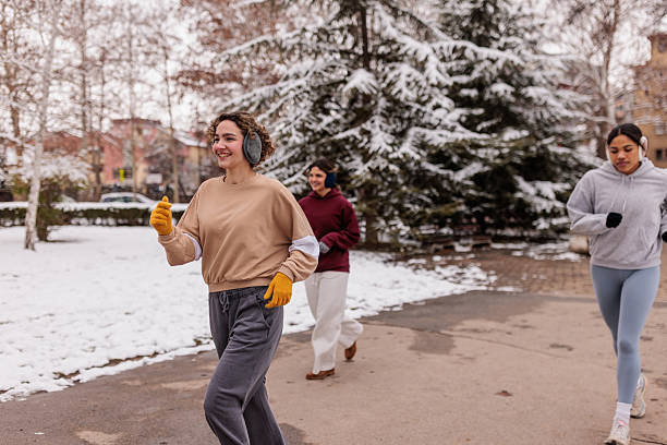 istock Women running outdoors on chilly winter morning 2232034187