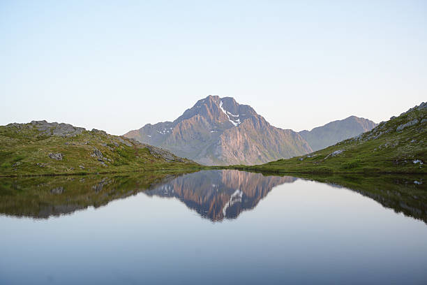 istock View across lagoon to distant mountain at sunrise 2232045702
