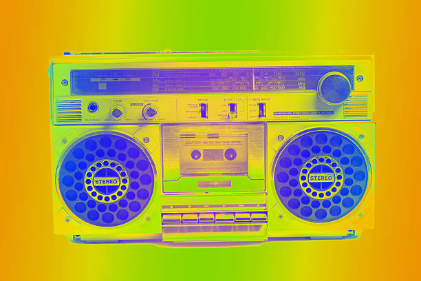 A lifestyle portrait of a beautiful black woman with boom boxes representing analog revival and 1980s Hip Hop Culture