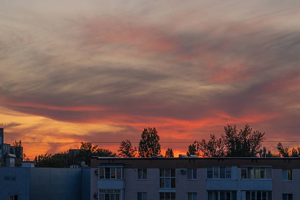 istock Horizontal view of vivid sunset over rooftops 2232050806