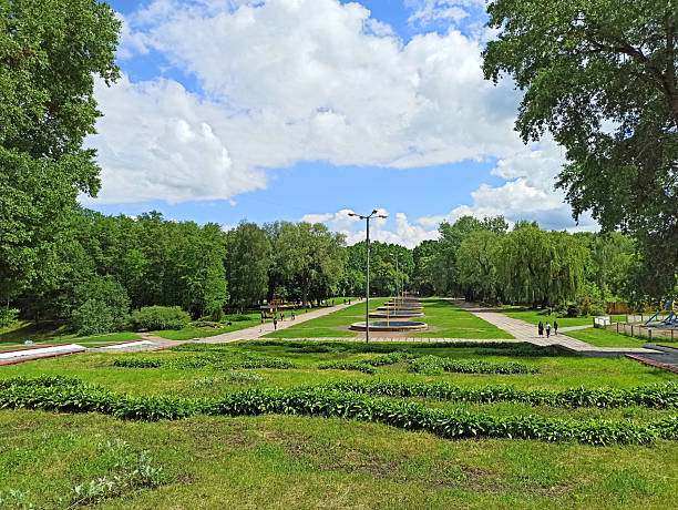 istock City park with promenade path in Chernihiv. A walking paths with large trees 2232051368