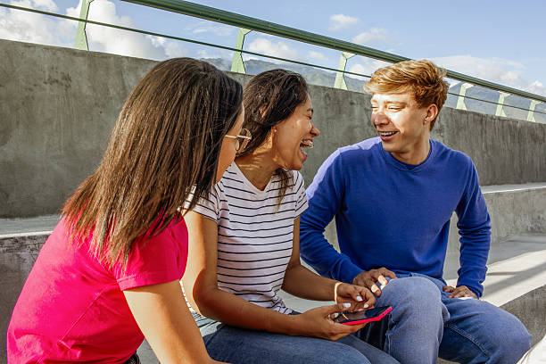 istock Diverse Friends Enjoying a Fun Break with Technology 2232054925