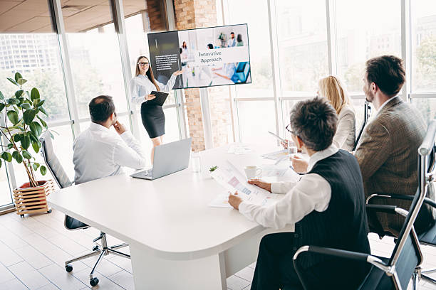 istock Business team collaborating during a presentation in a modern office, discussing innovative concepts and strategies 2232058456