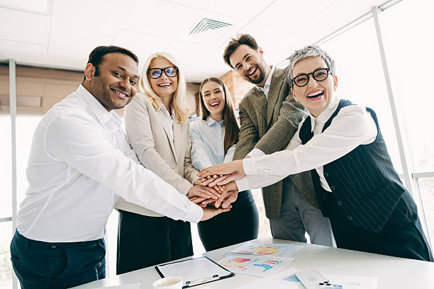 istock Diverse group of professionals collaborating in modern office for team-building and achieving business goals 2232058511