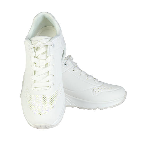 istock A pair of white sneakers on white background 2232069217