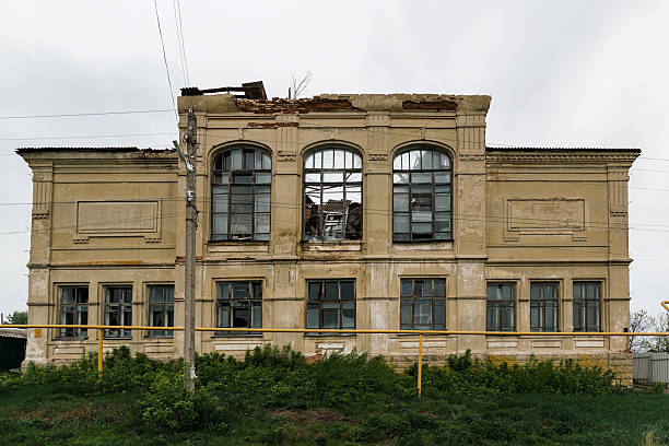 istock Old ruined overgrown abandoned school 2232069619