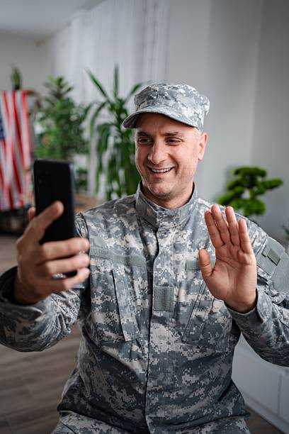 istock American soldier making a video call with his family 2232070468