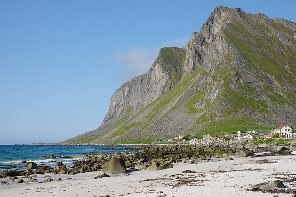istock View across beach, sea and mountains 2232073712