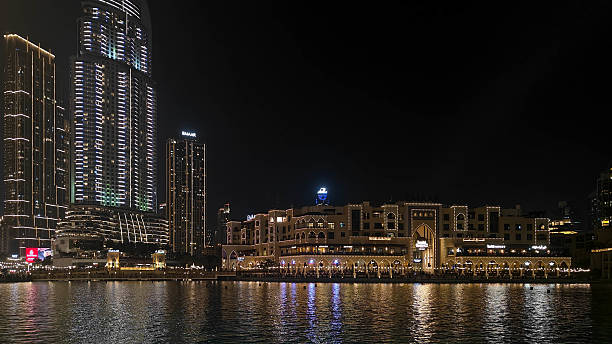 istock Glittering night skyline of Dubai with illuminated skyscrapers 2232074014
