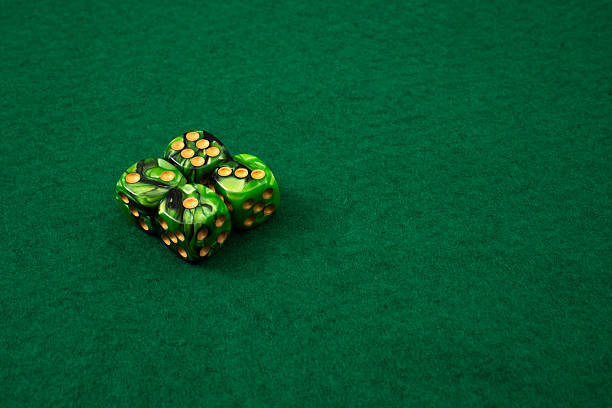 Close-Up Of Dices Over White Background
