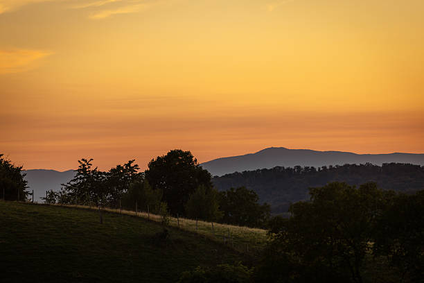 istock Sunset landscape from village. 2232074775
