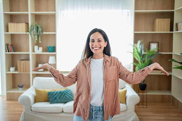 istock Real estate agent showing modern living room 2232075800