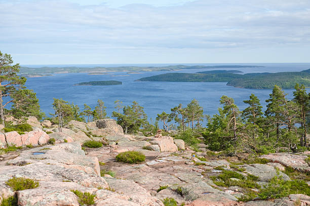 Rocky hill, trees and lake, High Coast/Hoga Kusten