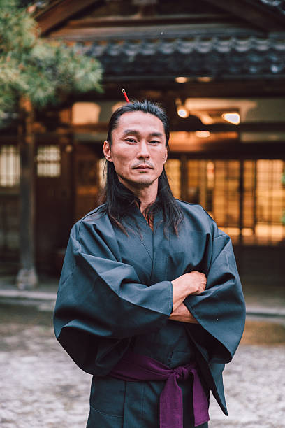 istock Japanese man in front of his home 2232079544