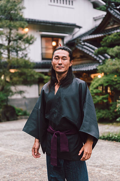 istock Japanese man in front of his home 2232079587