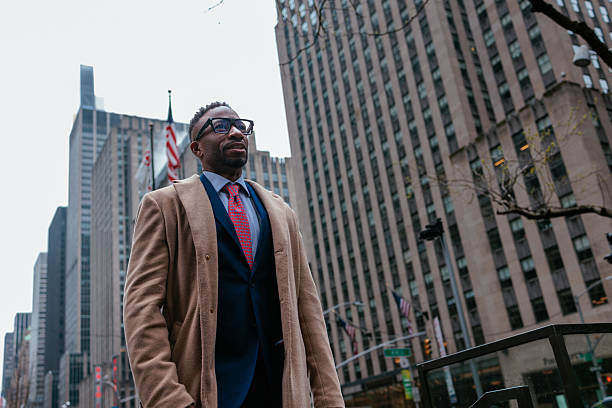 istock Businessman overlooking Manhattan streets 2232084667