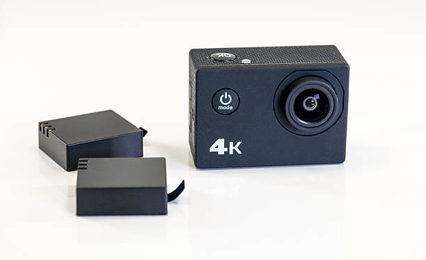 istock 4k action camera with two batteries on white background 2232088885