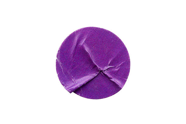 istock Blank purple round adhesive paper sticker label isolated on white background 2232091335