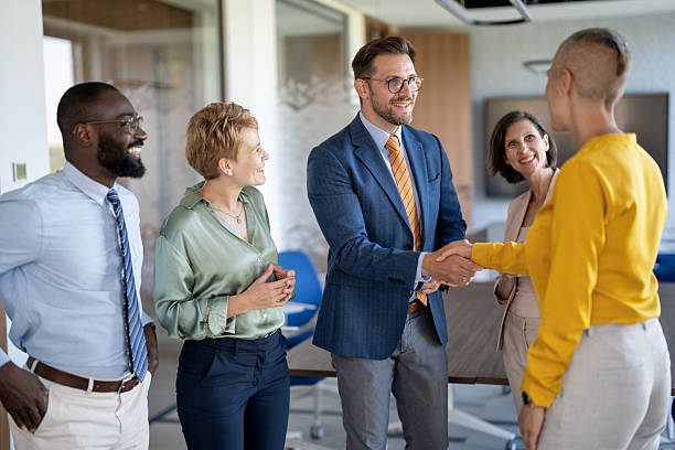 istock Business team celebrating successful agreement in modern office 2232092120