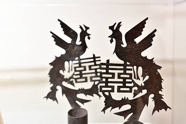 Picture of a sea dragon painted on a wooden door. It symbolically guards the entrance of the Thian Hock Keng Temple at Telok Ayer Street in Singapore. 