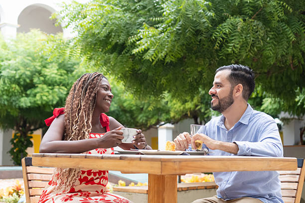 istock Interracial couple enjoying a relaxing breakfast outdoors 2232098212