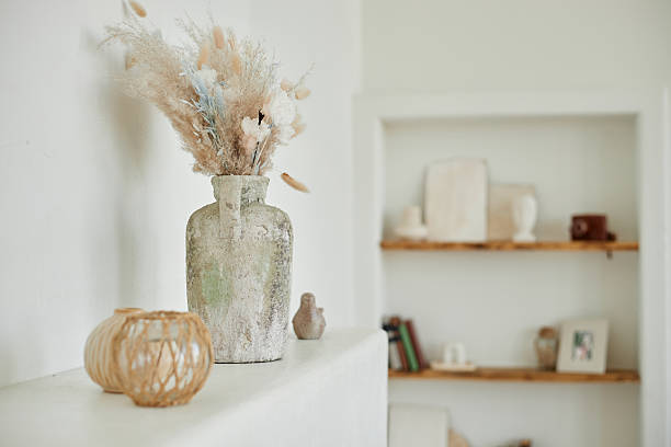 istock Dried Flower Arrangement Displaying in Rustic Vase on Minimalist Shelf 2232116239