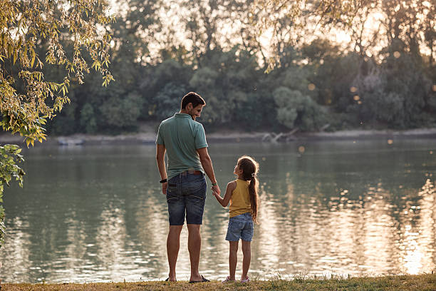 istock Father and daughter spending time in nature 2232119181