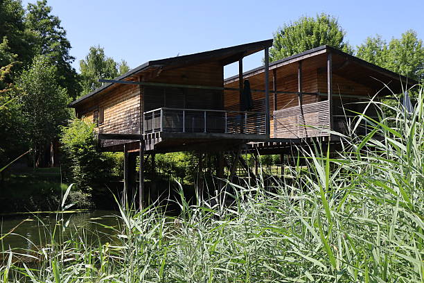 Wooden house on stilts, village of Chanaz, Savoie department, France