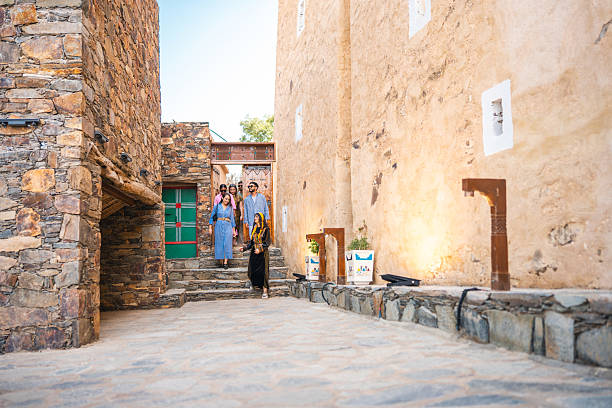 istock Middle Eastern Female Guide Leading Tour at Abu Sarrah Palace 2232122047