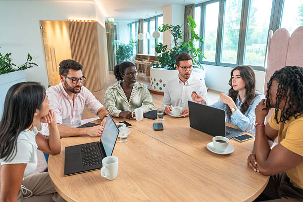 istock Diverse Business Team Collaborating in Bright Energy-Efficient Office 2232122665