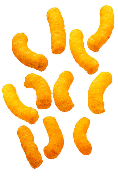 istock Corn snacks cheesy fly on the air on white background, Puff corn or Corn puffs cheese flavor isolate on white with clipping path. 2232127364