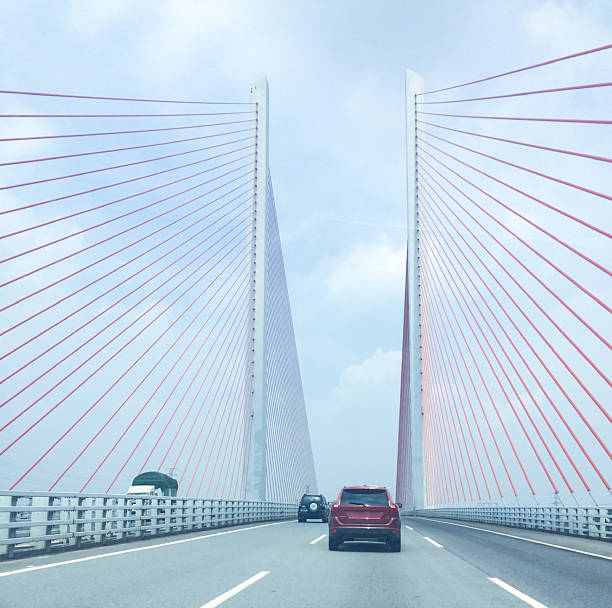 istock A very beautiful fan-shaped suspension bridge, with blue sky and white clouds 2232132378