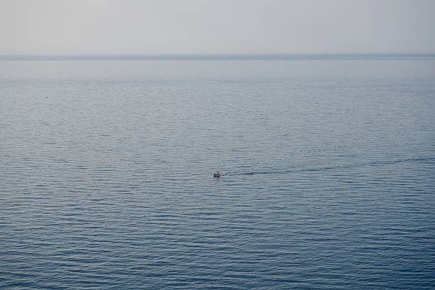 A boat sailing through the Mediterranean Sea
