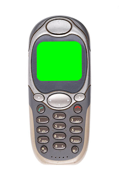 istock Classic mobile phone from the early 2000s with green screen isolated on white background. 2232138237