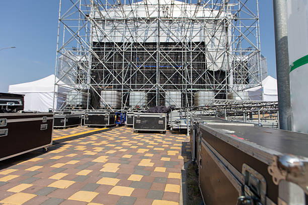 istock Boxes with concert equipment against a blurred stage. Preparing for a concert. 2232139875