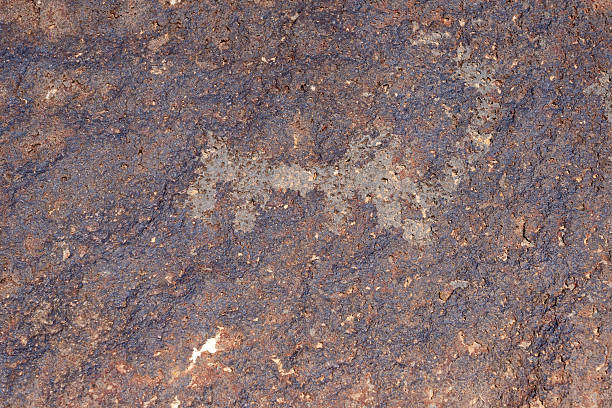 Ancient ornamental carving on volcanic rock