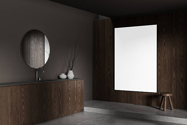 istock Minimalist interior with wooden textures and blank vertical poster mockup on dark wall for art, design, or branding presentation template concept. 3D Rendering 2232142541