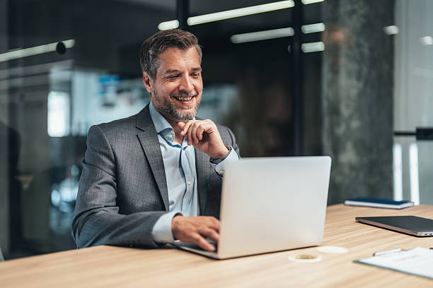 Confident businessman in his office