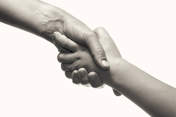 istock A metaphor for caring for and protecting a child. 2232143240