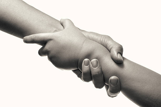 istock A metaphor for caring for and protecting a child. 2232143308