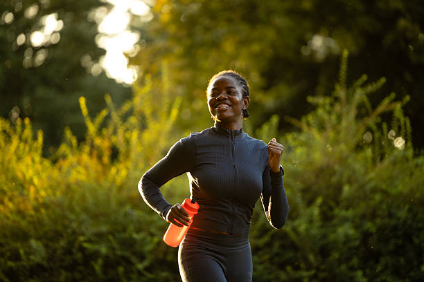 istock Running in the park during sunset. 2232147827
