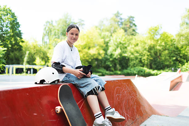 istock Girl skateboarding in skateboarding park 2232156184